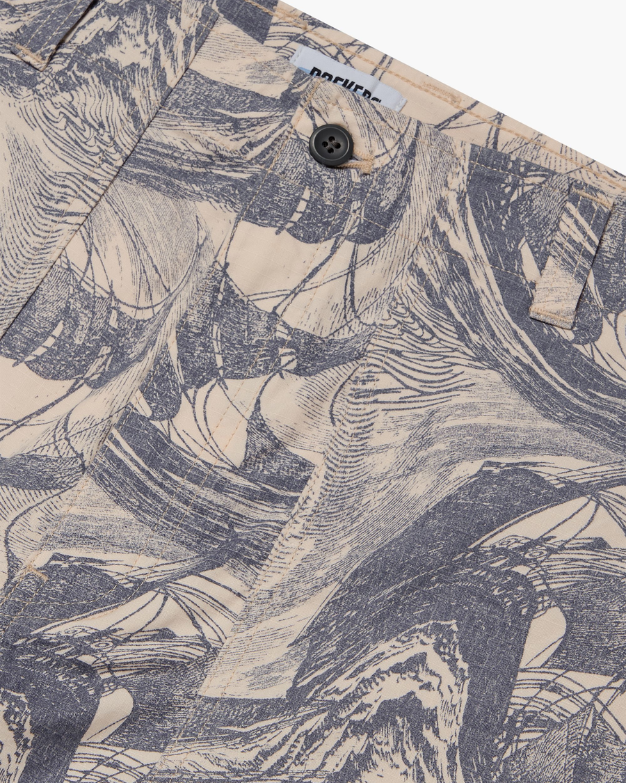 View of model wearing Ichabod Buttercream Eighty-Six Utility Pants, Loose Fit.