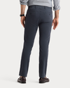 Back view of model wearing India Ink Ultimate Chinos, Slim Fit.