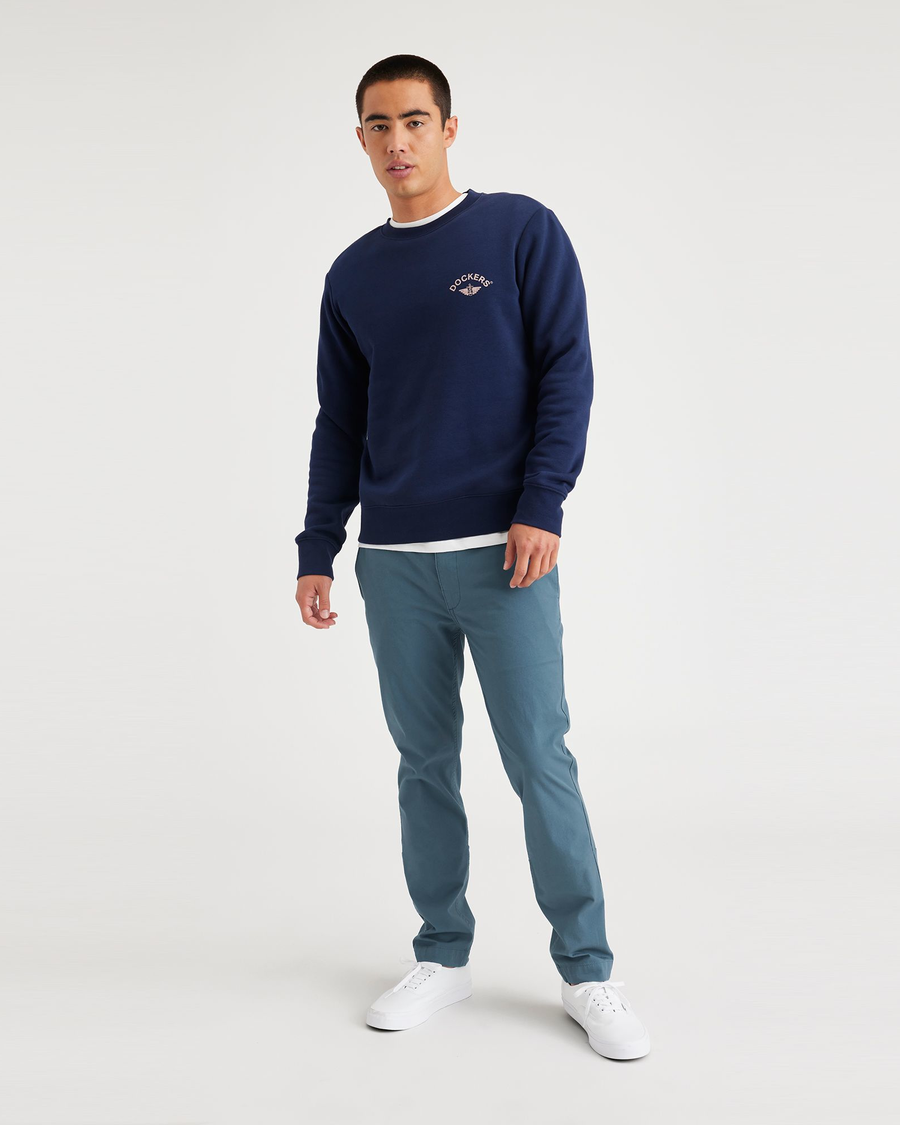 View of model wearing Indian Teal Men's Skinny Fit Smart 360 Flex California Chino Pants.