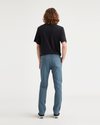 Back view of model wearing Indian Teal Men's Slim Fit Smart 360 Flex Alpha Chino Pants.