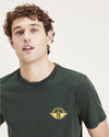 View of model wearing Lemon Curry Men's Slim Fit Logo Tee.