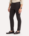 View of model wearing Licorice Crafted Khaki Pants, Slim Tapered Fit.