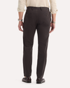 Back view of model wearing Licorice Crafted Khaki Pants, Slim Tapered Fit.