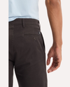 View of model wearing Licorice Original Chino Pants, Slim Fit.