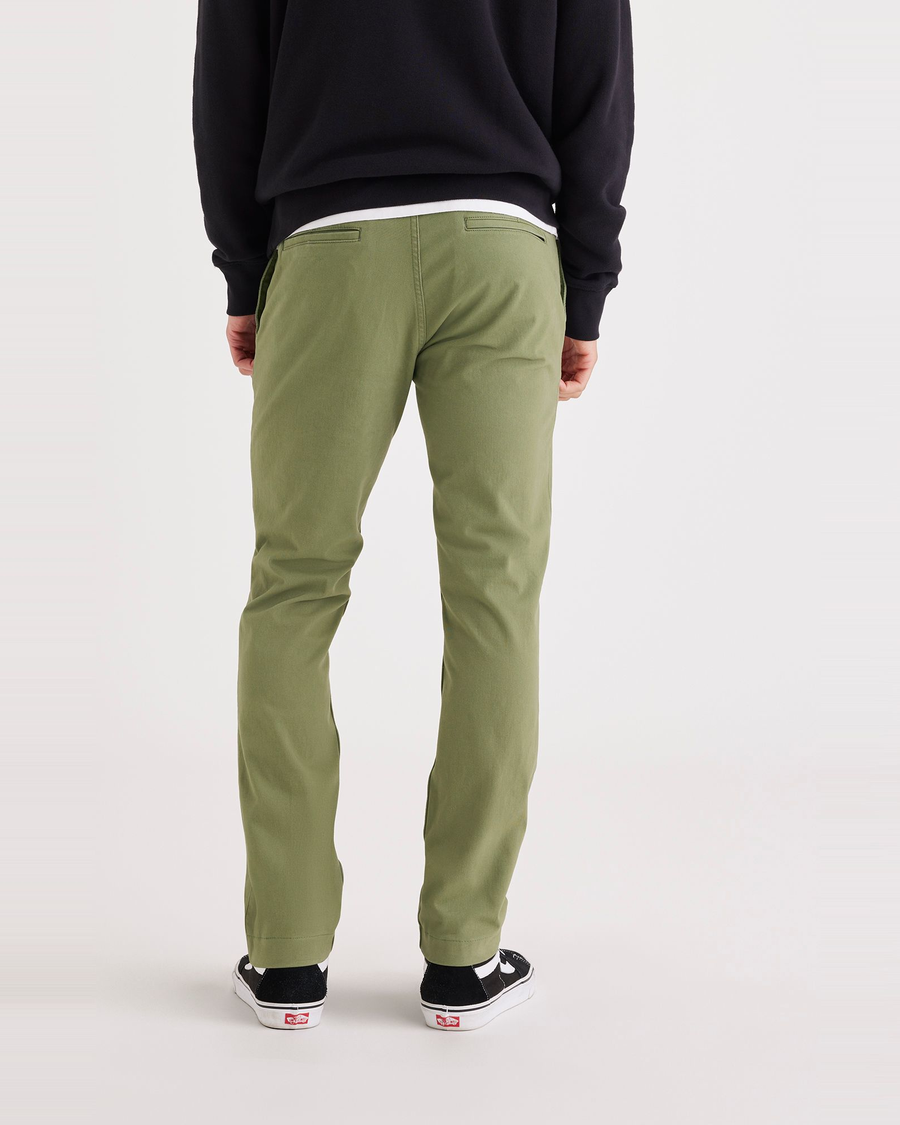 Back view of model wearing Loden Green Men's Skinny Fit Smart 360 Flex California Chino Pants.