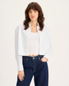Front view of model wearing Lucent White Boxy Cropped Shirt, Relaxed Fit.