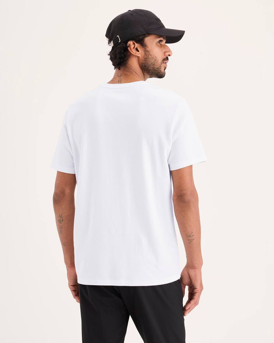 Back view of model wearing Lucent White Go Tee, Slim Fit.