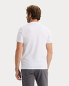 Back view of model wearing Lucent White Go Tee, Slim Fit.