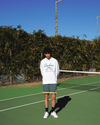 View of model wearing Lucent White Racquet Club Collared Sweatshirt, Relaxed Fit.