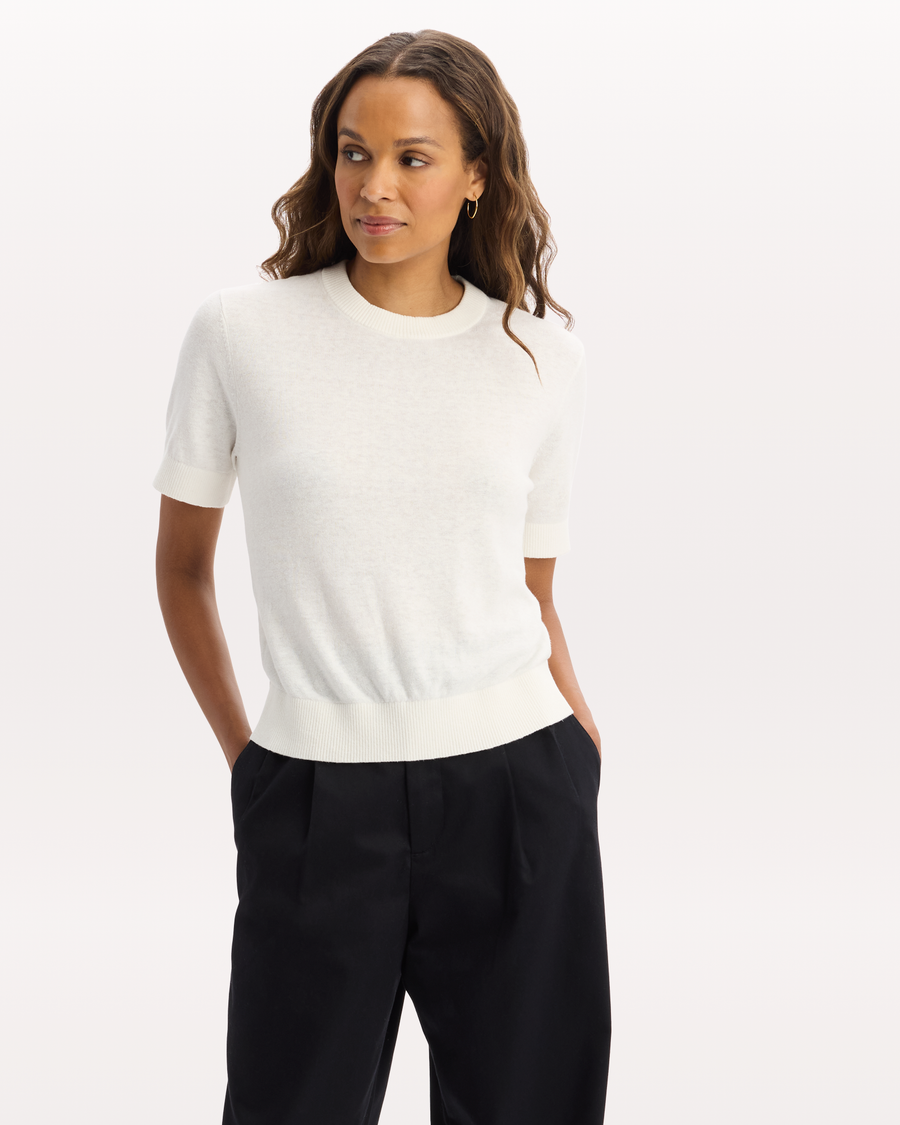 View of model wearing Lucent White Sweater Tee, Regular Fit.