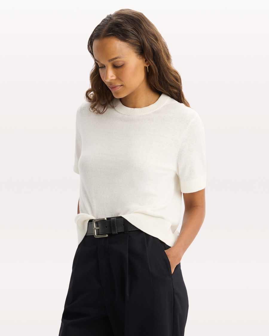 View of model wearing Lucent White Sweater Tee, Regular Fit.