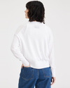 Back view of model wearing Lucent White Women's Relaxed Fit Cropped Cardigan Sweater.