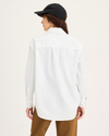 Back view of model wearing Lucent White Women's Shirt, Relaxed Fit.