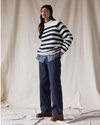 View of model wearing Mariner Navy Dockers® x Transnomadica Mariner Sweater.