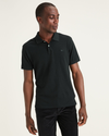 Front view of model wearing Mineral Black Men's Slim Fit Rib Collar Polo.