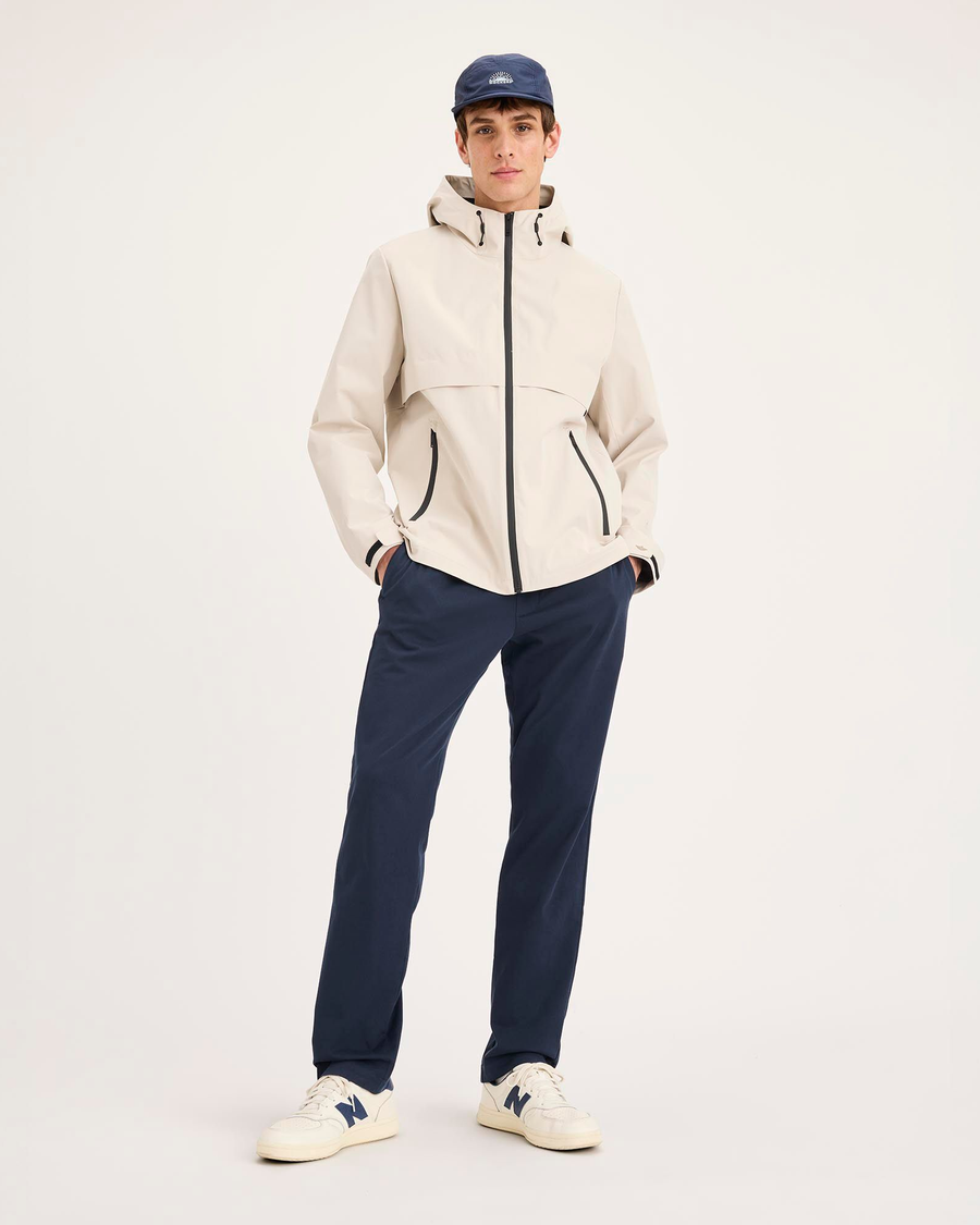 View of model wearing Navy Blazer Go Activeflex Pull-On Pant, Slim Fit.