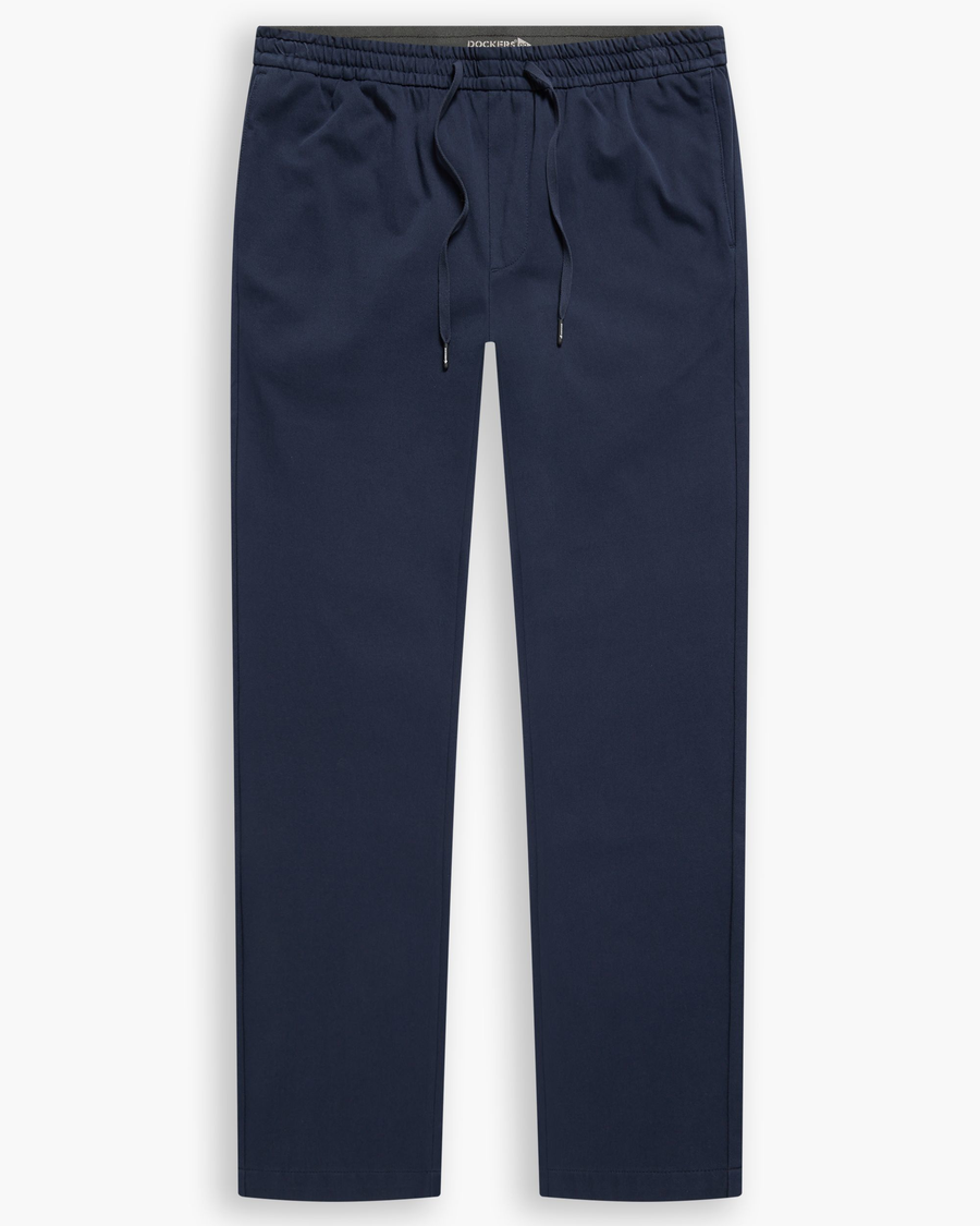 View of model wearing Navy Blazer Go Activeflex Pull-On Pant, Slim Fit.