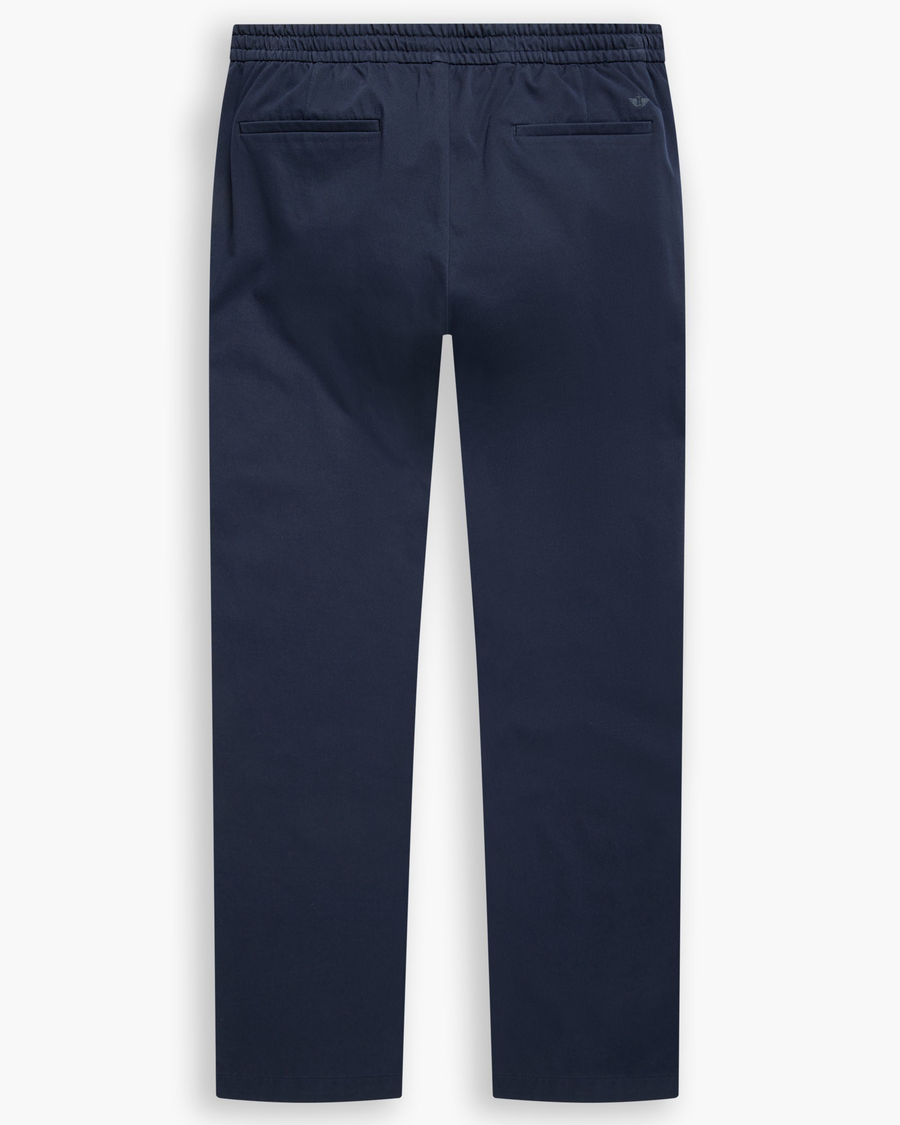 View of model wearing Navy Blazer Go Activeflex Pull-On Pant, Slim Fit.