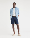 View of model wearing Navy Blazer Men's Classic Fit Original Pleated Shorts.
