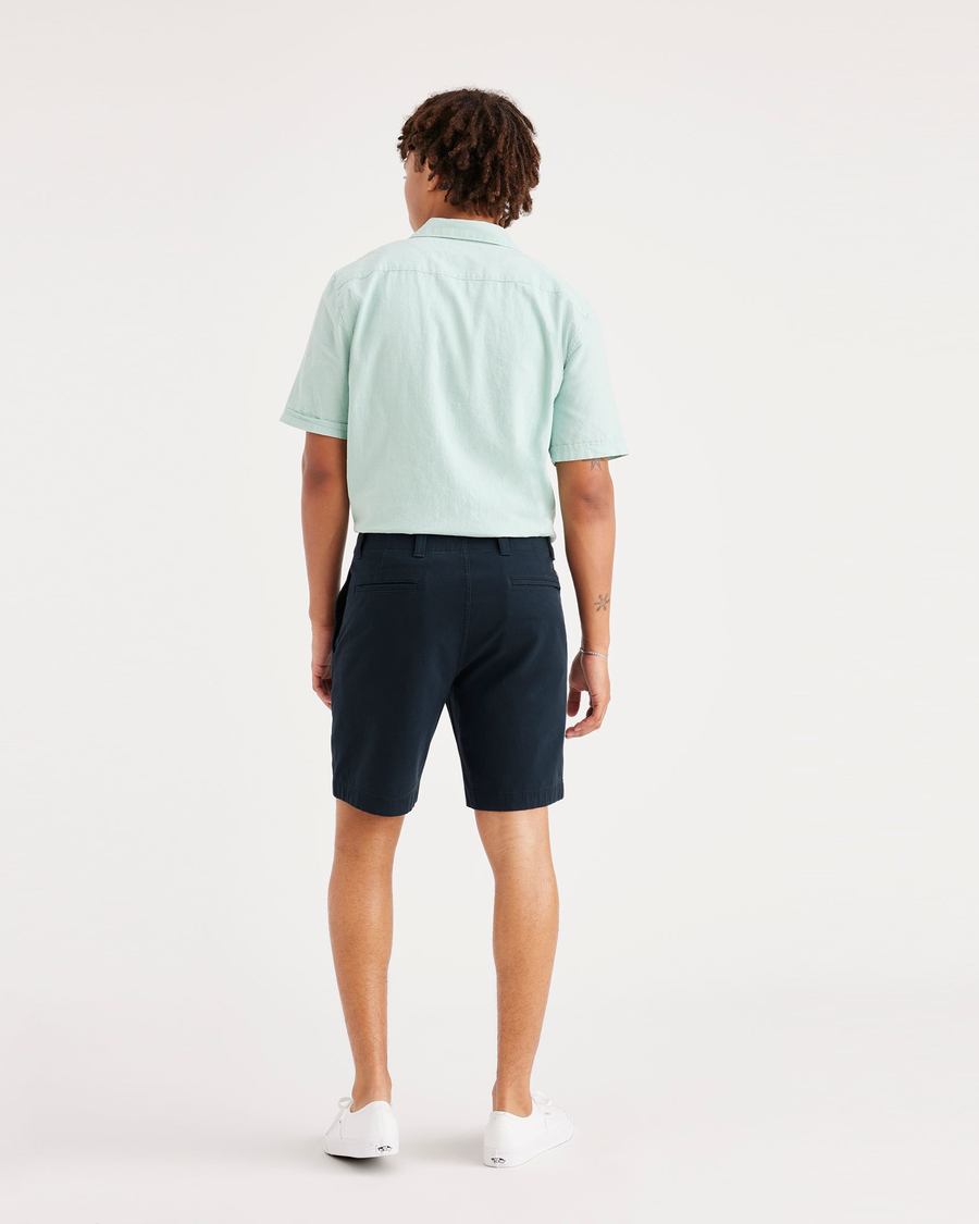 Back view of model wearing Navy Blazer Men's Straight Fit California Shorts.