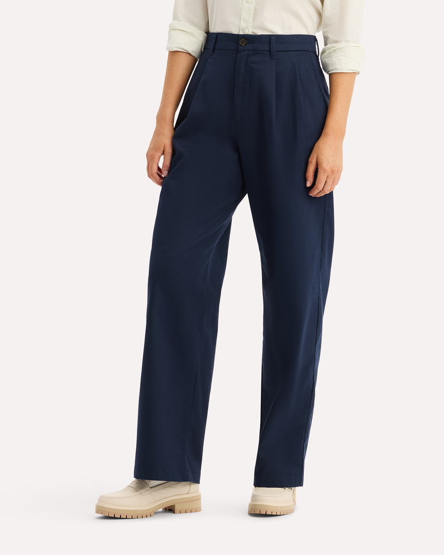 View of model wearing Navy Blazer Signature Iron Free Khakis, High Wide with Stain Defender®.