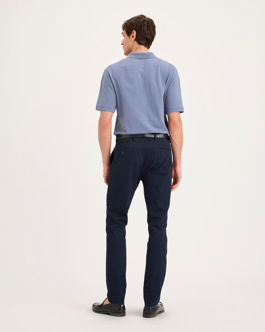 Back view of model wearing Navy Blazer Signature Iron Free Khakis, Skinny Fit with Stain Defender®.