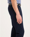 Side view of model wearing Navy Blazer Signature Iron Free Khakis, Skinny Fit with Stain Defender®.