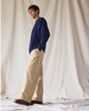 Front view of model wearing New British Khaki Dockers® x Transnomadica Rigger Pant.