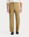 Front view of model wearing New British Khaki Eighty-Six Original Chino Pants, Loose Fit.