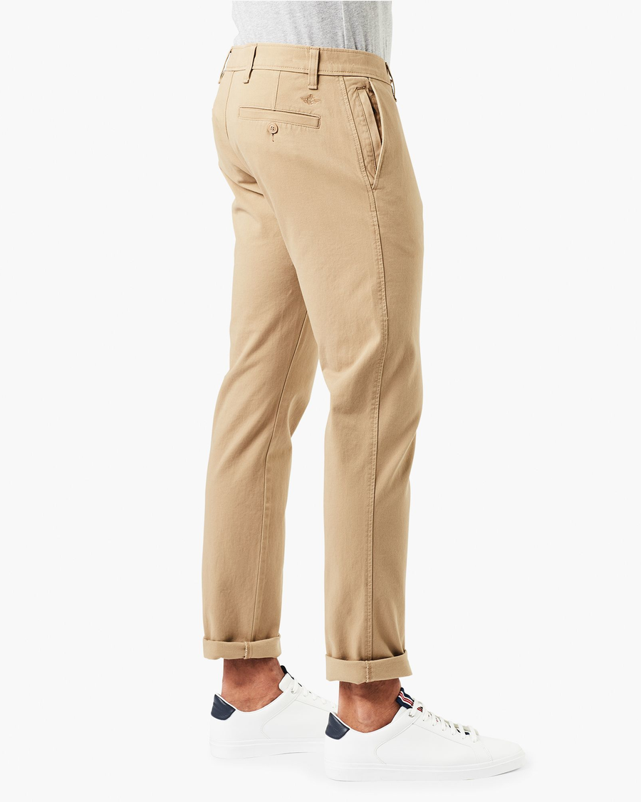 Side view of model wearing New British Khaki Men's Smart 360 Flex Ultimate Chino.