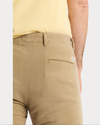 View of model wearing New British Khaki Original Chino Pants, Slim Fit.