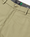 View of model wearing New British Khaki Signature Iron Free Khakis, Skinny Fit with Stain Defender®.