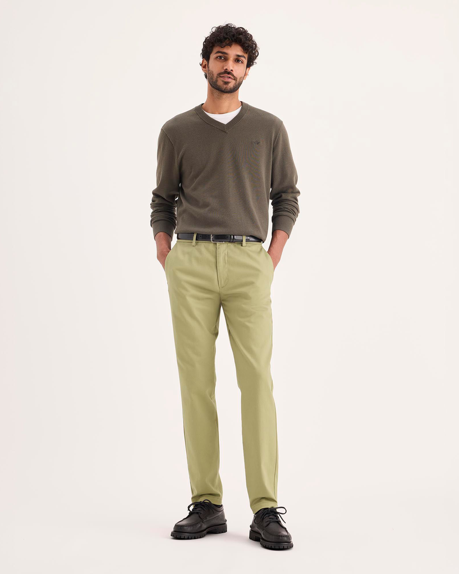 Front view of model wearing New British Khaki Signature Iron Free Khakis, Skinny Fit with Stain Defender®.