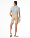 Back view of model wearing New British Khaki Ultimate Shorts.