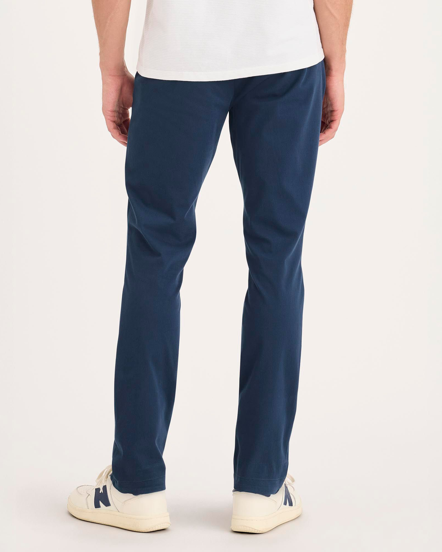 Back view of model wearing Ocean Blue Go Activeflex Chino, Skinny Fit.