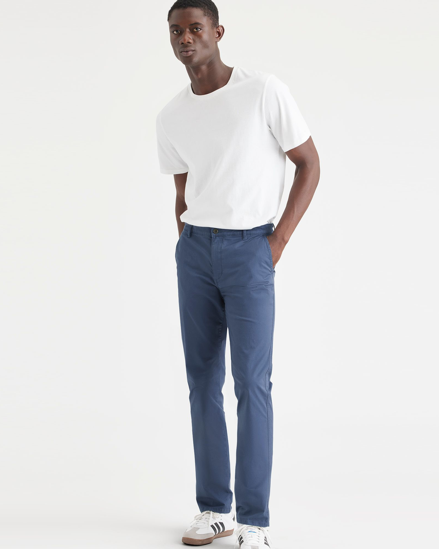 View of model wearing Ocean Blue Men's Slim Fit Original Chino Pants.