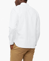 Back view of model wearing Paper White Big and Tall Button Collar Shirt.