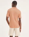 Back view of model wearing Peach Bloom Men's Slim Fit Pique Polo.