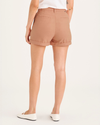 Back view of model wearing Peach Bloom Women's Original Chino Shorts.