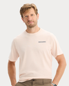 View of model wearing Peach Blush Graphic Tee, Regular Fit.