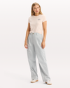 View of model wearing Peach Blush Graphic Tee, Slim Fit.