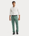 View of model wearing Playoff Tea 2 Button Collar Shirt, Slim Fit.