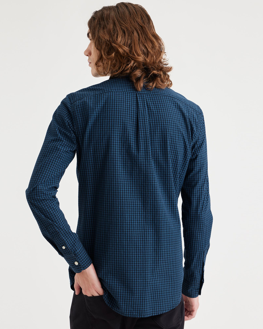 Back view of model wearing Ripple Navy Blazer Men's Slim Fit Icon Button Up Shirt.