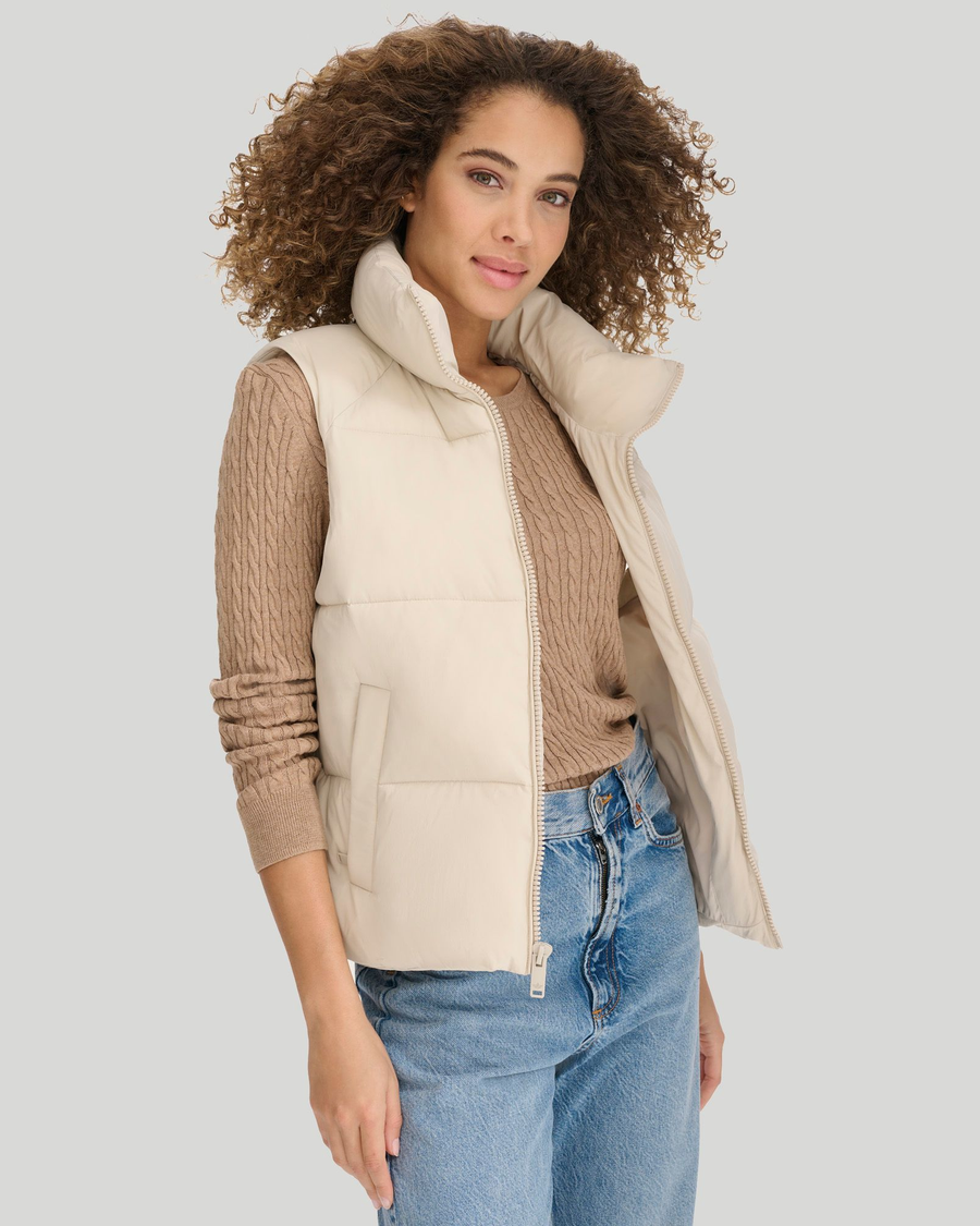 Front view of model wearing Sahara Khaki Women's Puffer Vest Jacket.