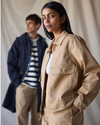 View of model wearing Seaworthy Khaki Dockers® x Transnomadica Mechanics Jacket.