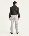 Back view of model wearing Sharkskin Men's Straight Fit Utility Pants.