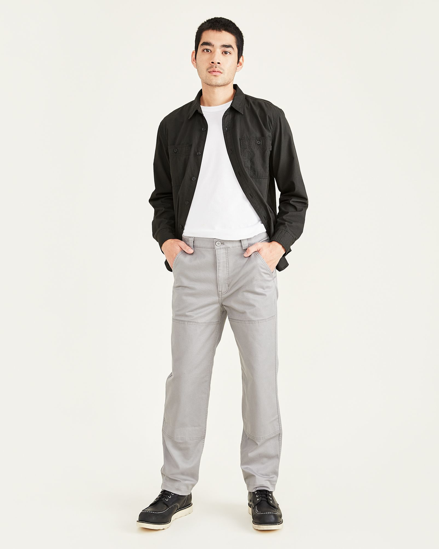 Front view of model wearing Sharkskin Men's Straight Fit Utility Pants.