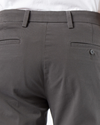 View of model wearing Storm Workday Khakis, Slim Fit.