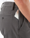 View of model wearing Storm Workday Khakis, Slim Fit.