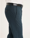 Side view of model wearing Stratified Sea Men's Slim Fit Smart 360 Flex Alpha Chino Pants.